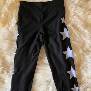 EVCR leggings. Side stars. Size medium. NWT.